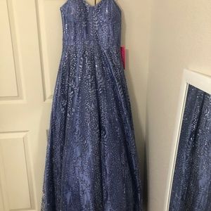Formal prom gown, size 5, glitter embellishments, purple/ periwinkle color.